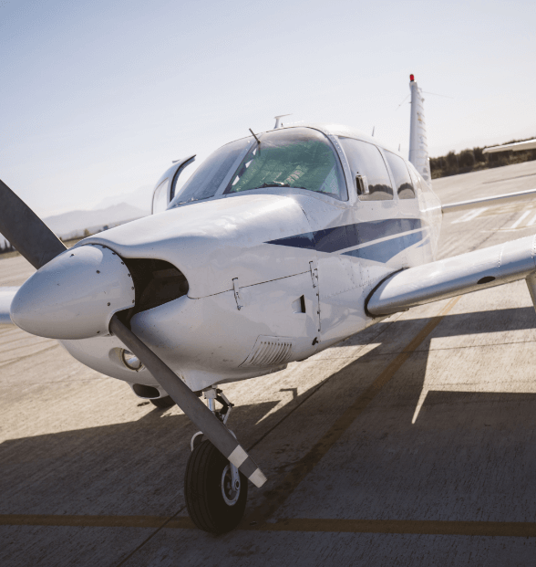 Light aircraft parked on a runway